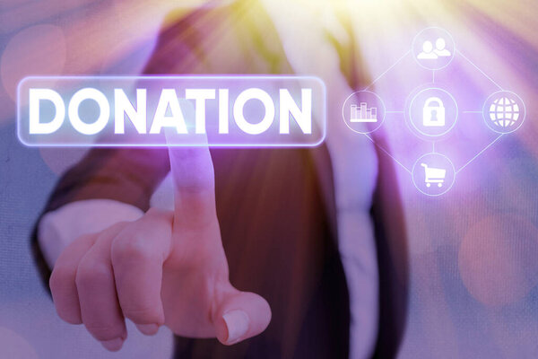 Conceptual hand writing showing Donation. Business photo showcasing something that is given to a charity, especially a sum of money.