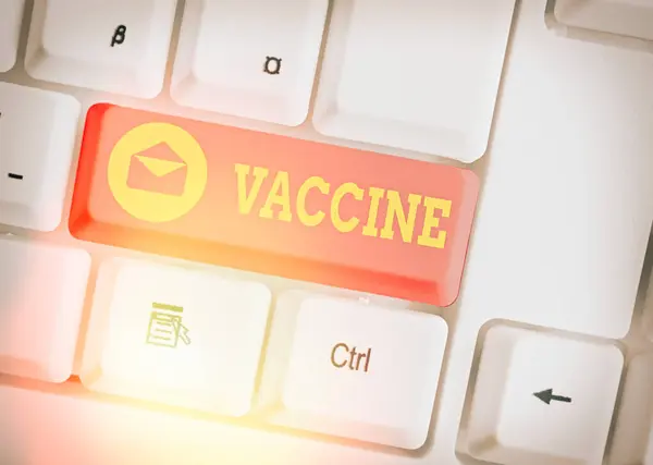 Λέξη που γράφει το εμβόλιο κειμένου. Επιχειρηματική έννοια για την παρασκευή θανατωμένων μικροοργανισμών ή ζώντων εξασθενημένων οργανισμών. — Φωτογραφία Αρχείου