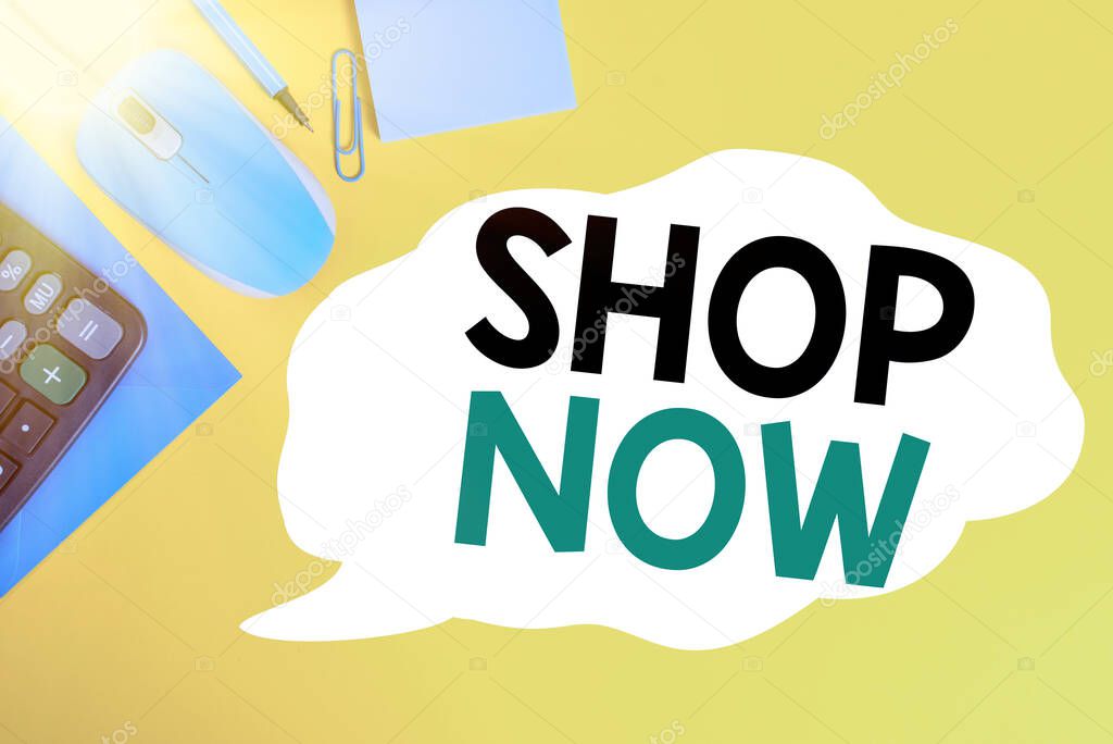 Writing note showing Shop Now. Business photo showcasing the action or activity of purchasing goods from stores or online Closed envelope clip mouse calculator pencil note colored background.
