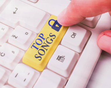 Top Songs 'u gösteren kavramsal el yazısı. Ticari fotoğraf metni, popüler ya da iyi tanınan bir şarkı kaydetti.