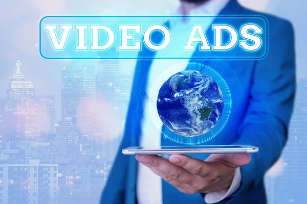 Text sign showing Video Ads. Conceptual photo Engage audience in the form of video content advertising Elements of this image furnished by NASA. — Stock Photo, Image