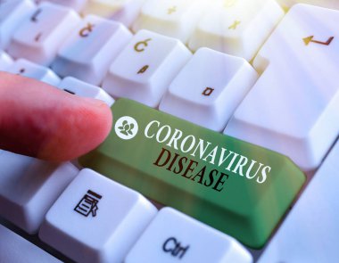 Coronavirus Hastalığı 'nın el yazısı. Yeni bir virüs olan SARSCoV2 'nin neden olduğu hastalık olarak tanımlanan kavram.