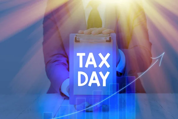 Rukopis Daňový den. Pojetí znamenající hovorový termín pro dobu, po kterou se podává přiznání k dani z příjmu. — Stock fotografie