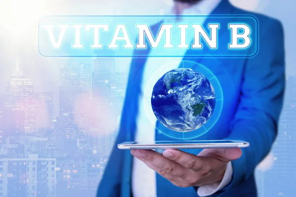 B-vitamint mutató szöveges jel Fogalmi fotó A NASA által biztosított tápanyag, amely segít a szervezet ideg- és vérsejtjeinek egészségben tartásában. — Stock Fotó