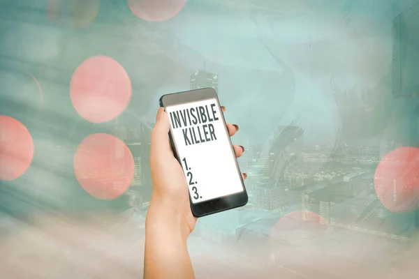 Conceptual hand writing showing Invisible Killer. Business photo text presence into the air of a substance which are harmful.