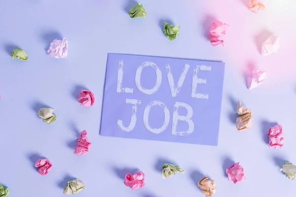 Conceptual hand writing showing Love Job. Business photo showcasing designed to help locate a fulfilling job that is right for us Colored clothespin rectangle shaped paper blue background.