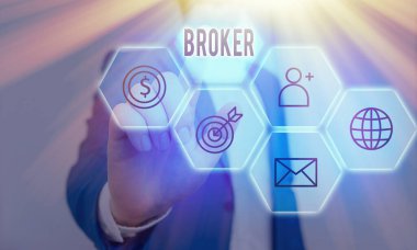 Broker 'ın el yazısı. Kavram, ticari müzakerelerde güvenilir bir ajan veya aracı görevi görür.