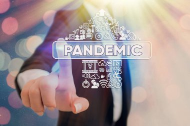 Pandemiyi gösteren kavramsal el yazısı. İş fotoğraflarının geniş bir alana yayılması nüfusun yüksek oranını etkiliyor.