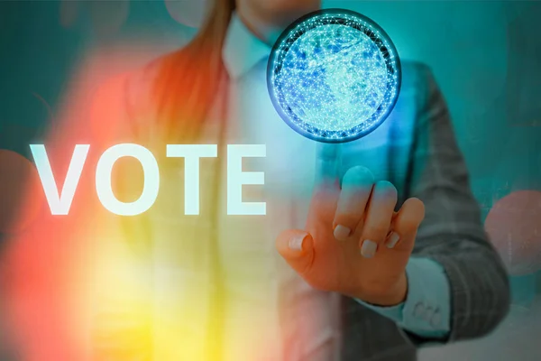 Writing note showing Vote. Business photo showcasing Act of expressing a formal indication of choice Majority wins Elements of this image furnished by NASA.