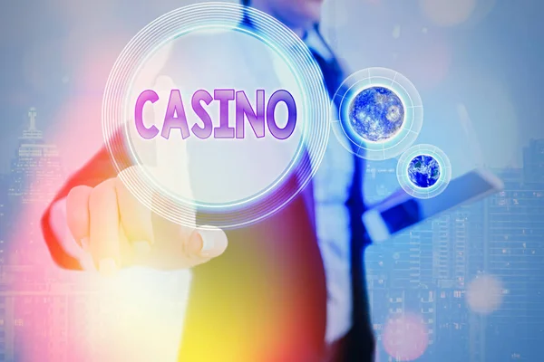 Escribir nota que muestra Casino. Foto de negocios mostrando un edificio donde se juegan juegos especialmente ruleta y juegos de cartas Elementos de esta imagen proporcionados por la NASA . — Foto de Stock