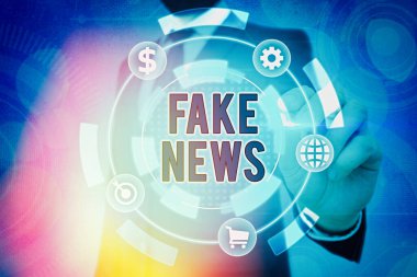 Sahte haberleri gösteren bir not yazıyorum. Sahte bilgi içeren iş fotoğrafı gerçek haber olma kisvesi altında yayınlandı.