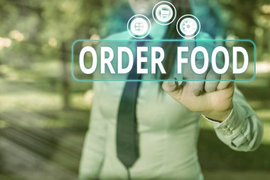 Yemek siparişini gösteren kavramsal el yazısı. Bir restoranda tercih edilen yemeği talep etme sürecini gösteren iş fotoğrafı..