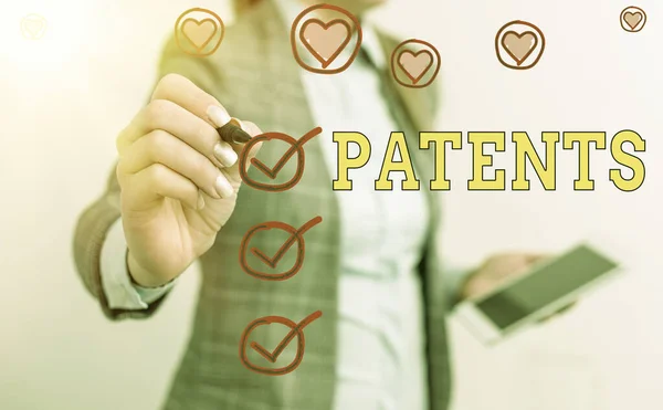 Sinal de texto mostrando Patentes. Foto conceitual autoridade governamental ou licença que confere um direito ou título . — Fotografia de Stock