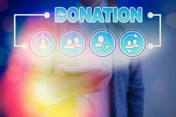 Signo de texto mostrando Donación. Foto conceptual algo que se da a una organización benéfica, especialmente una suma de dinero . —  Fotos de Stock