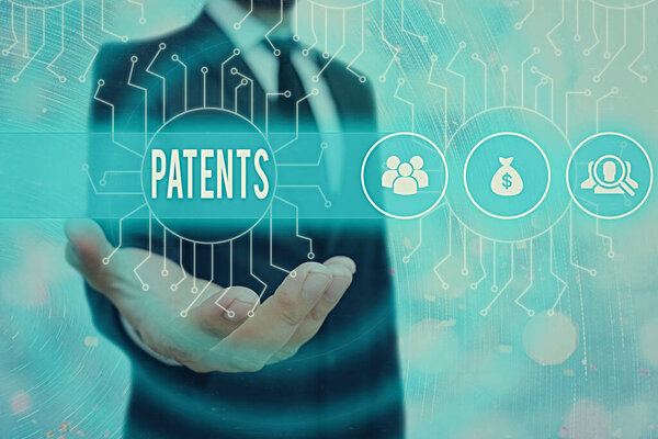 Conceptual hand writing showing Patents. Business photo text government authority or licence conferring a right or title.