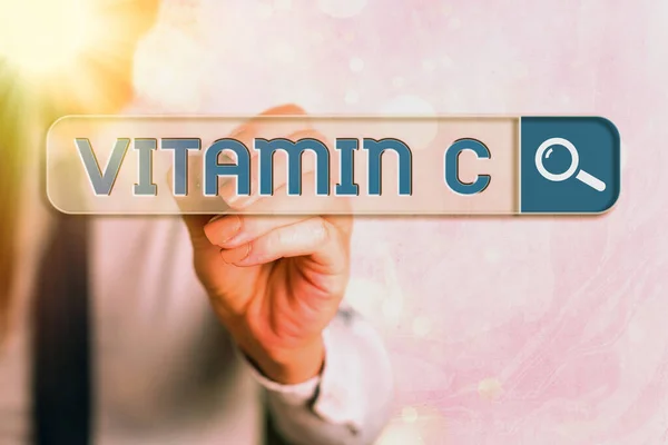 Textul de scriere a cuvintelor Vitamina C. Conceptul de afaceri pentru aceasta promovează vindecarea și ajută organismul să absoarbă acidul ascorbic de fier . — Fotografie, imagine de stoc