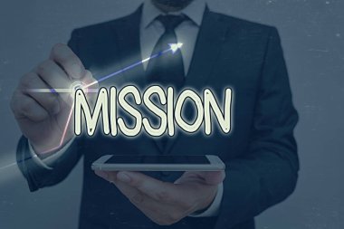 Görevimizi gösteren kavramsal el yazısı. İş fotoğrafı metni Şirket hedefi Önemli Atanma İş amacı ve odaklanma.