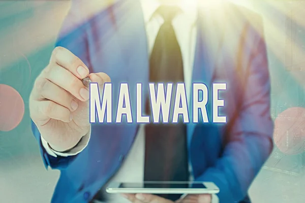 Word writing text Malware. Business concept for malicious software or file that is harmful to a computer user. — Stok fotoğraf