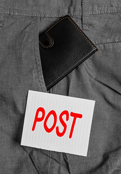 Word writing text Post. Business concept for a piece of writing, image, or other item of content published online Small little wallet inside man trousers front pocket near notation paper. — Stock Photo, Image