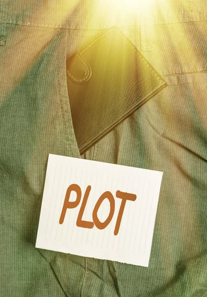 stock image Word writing text Plot. Business concept for sequence of events inside a story where each event affects the next Small little wallet inside man trousers front pocket near notation paper.