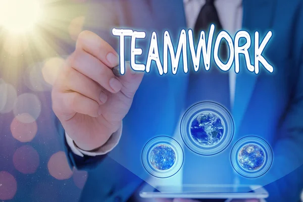 Word writing text Teamwork. Business concept for combined action of group especially when effective and efficient Elements of this image furnished by NASA. — Stock Photo, Image