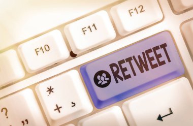 Conceptual hand writing showing Retweet. Business photo showcasing in twitter repost or forward a message posted by another user.