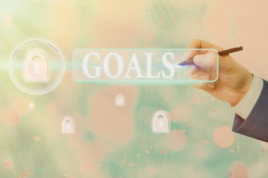 Writing note showing Goals. Business photo showcasing demonstratings ambition or effort aim desired result Sport match Winning.