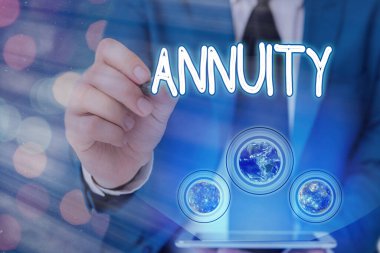Word writing text Annuity. Business concept for fixed sum of money paid to someone each year Series of payments Elements of this image furnished by NASA. clipart