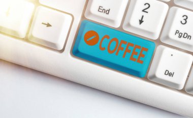 Handwriting text Coffee. Concept meaning hot drink made from the roasted and ground seeds of a tropical shrub.