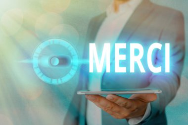 El yazısı Merci. Anlamı, Fransa 'da biri size yardım ettiğinde söylenen ya da verilen cevap. Teşekkürler..