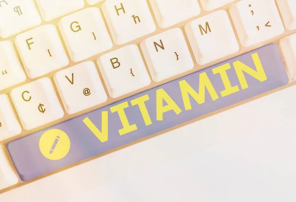 Word writing text Vitamin. Business concept for group of organic compounds which are essential for normal growth. — Stock Photo, Image