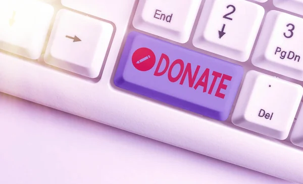 Psaný text Darovat. Koncept význam dát peníze nebo zboží pro dobrý důvod, například na charitu nebo ukazování. — Stock fotografie