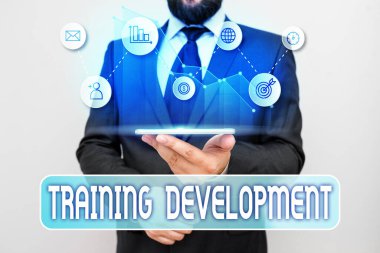 Eğitim Gelişimini gösteren bir not yazıyorum. İş fotoğrafı gösterimi Öğrenme ve genişletme becerileri ve bilgi programı.
