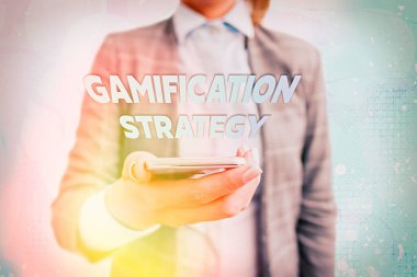 Gamification Strategy 'yi gösteren kavramsal el yazısı. Motivasyon Entegre Oyun Mekanikleri için iş fotoğrafı gösterimi kullanım ödülleri.