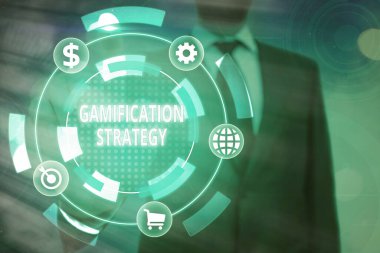 Gamification Strategy 'yi gösteren kavramsal el yazısı. Motivasyon Entegre Oyun Mekaniği için iş fotoğrafı metni kullanımı ödülleri.