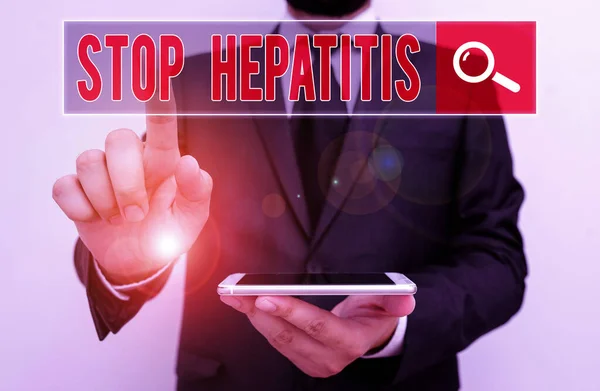 Escribiendo una nota que muestra Stop Hepatitis. Exposición de fotos de negocios Tratamiento o prevención de la inflamación del hígado . — Foto de Stock