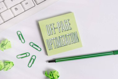Text sign showing Off Page Optimization. Conceptual photo Website External Process Promotional Method Ranking Square empty green note paper with pencil on the white background and pc keyboard. clipart