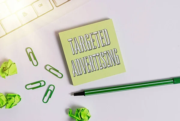 Text sign showing Targeted Advertising. Conceptual photo Online Advertisement Ads based on consumer activity Square empty green note paper with pencil on the white background and pc keyboard.