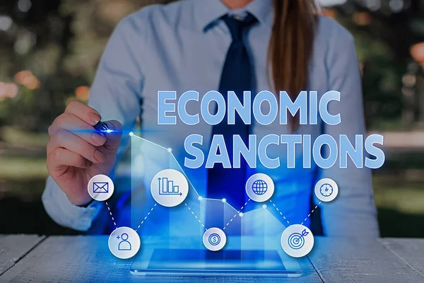 Text sign showing Economic Sanctions. Conceptual photo Penalty Punishment levied on another country Trade war.