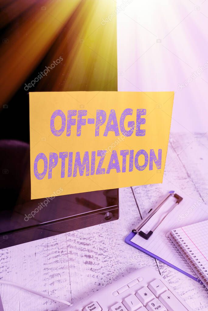 Handwriting text writing Off Page Optimization. Concept meaning Website External Process Promotional Method Ranking Note paper taped to black computer screen near keyboard and stationary.