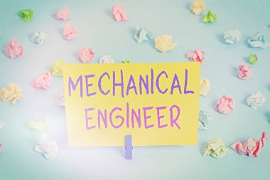 Makine Mühendisini gösteren metin işareti. Mekanik Sistem Renkleri İçin Uygulanan Kavramsal Fotoğraf Uygulamalı Mühendislik Disiplini Buruşmuş kağıtlar Boş hatırlatıcı mavi zemin çamaşır mandalı.