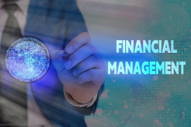 Finansal Yönetimi gösteren bir not yazıyorum. NASA tarafından desteklenen bu görüntünün Para ve Fon Elementlerini yönetmek için verimli ve etkili bir yol gösteren iş fotoğrafı.