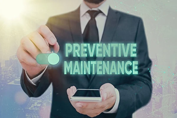 Handwriting text Preventive Maintenance. Concept meaning Avoid Breakdown done while machine still working.