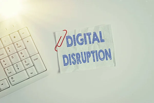 Writing note showing Digital Disruption. Business photo showcasing Changes that affect technology markets Product makeover White pc keyboard with empty note paper above white background.