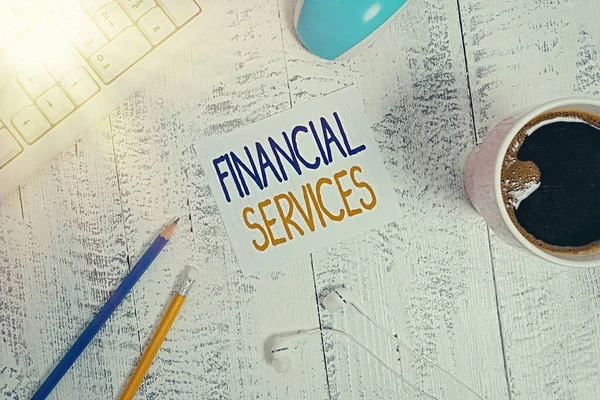 Word writing text Financial Services. Geschäftskonzept für Geld und Investment Leasing Lending Stocks Brokerages technologische Geräte farbige Erinnerung Papier Bürobedarf Tastatur-Maus. — Stockfoto