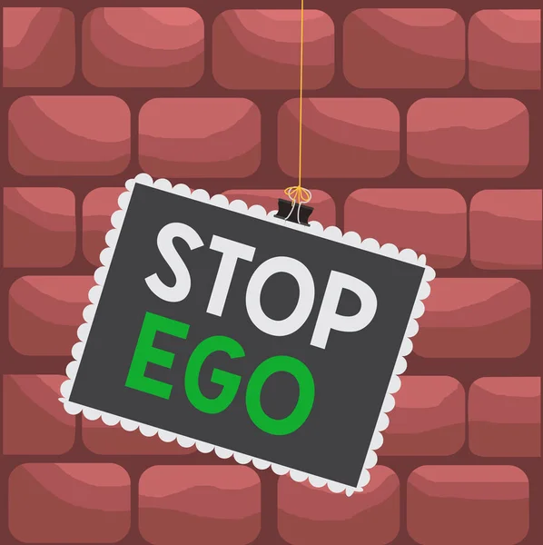 Texte manuscrit Stop Ego. Concept signifiant Contrôlez votre obsession à propos d'une décision ou d'un événement ou quoi que ce soit Timbre collé liant trombones cadre carré couleur pointe arrondie autocollant . — Photo