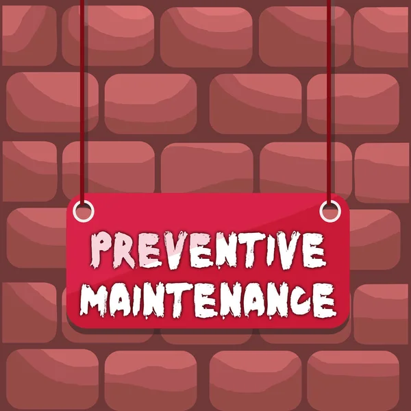 Handwriting text writing Preventive Maintenance. Concept meaning Avoid Breakdown done while machine still working Board color background plank attached string panel rectangle empty surface.