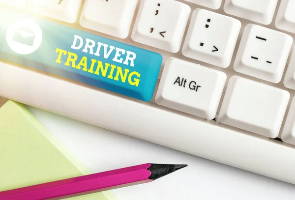 Handwriting text Driver Training. Concept meaning prepares a new driver to obtain a driver s is license.