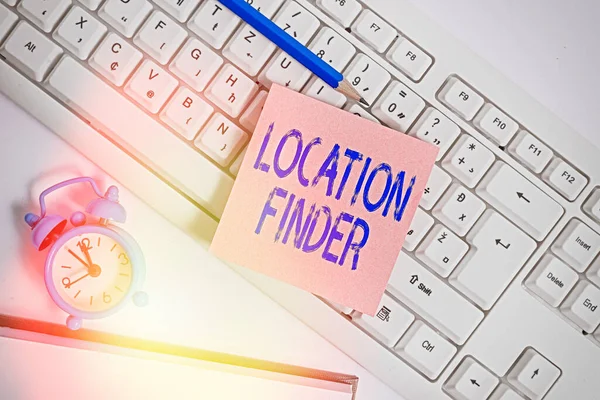 Handwriting text Location Finder. Concept meaning A service featured to find the address of a selected place Empty copy space red note paper bubble above pc keyboard for text message. — Stock Photo, Image