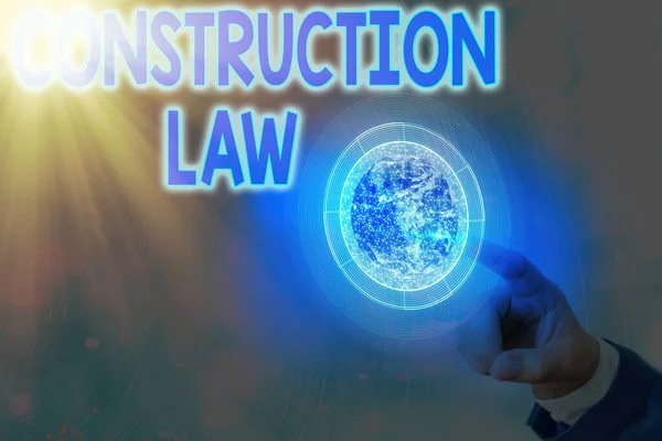 Text sign showing Construction Law. Conceptual photo deals with matters relating to building and related fields Elements of this image furnished by NASA. — Stock Photo, Image